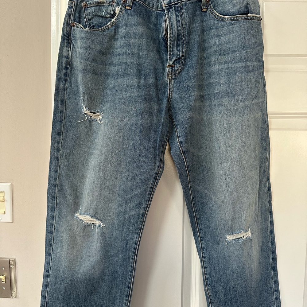 Distressed Blue Denim Jeans